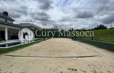 Imagem: A casa possui 4 Dormitórios, 5 Banheiros, 2 Vagas na garagem