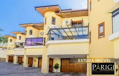 Imagem: A casa em condomínio possui 3 Dormitórios, 3 Banheiros, 3