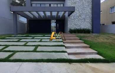 Imagem: A casa em condomínio possui 5 Dormitórios, 5 Banheiros, 2