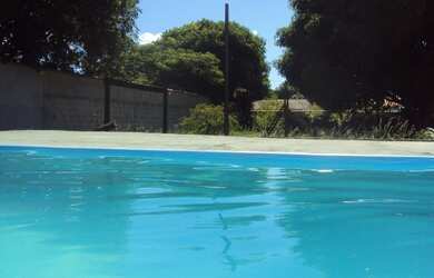 Imagem: A casa possui 1 Dormitório, 3 Vagas na garagem e está localizado