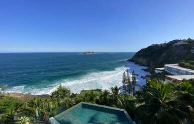 Imagem: A casa possui 5 Dormitórios, 5 Banheiros, 3 Vagas na garagem