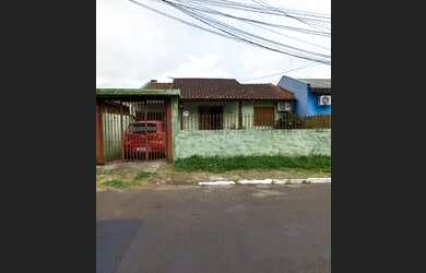 Imagem: A casa e possui 2 Dormitórios, Suítes, 1 Banheiro, 1 Vaga