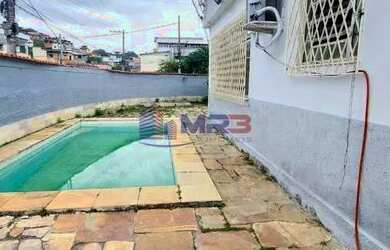 Imagem: A casa possui 3 Dormitórios, 3 Banheiros, 3 Vagas na garagem