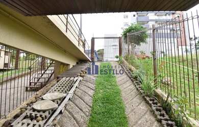 Imagem: A casa possui 2 Dormitórios, 2 Banheiros, 3 Vagas na garagem