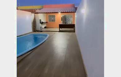 Imagem: A casa possui 2 Dormitórios, 1 Banheiro, 2 Vagas na garagem