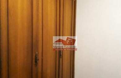 Imagem: A casa possui 4 Dormitórios, 4 Banheiros, 5 Vagas na garagem