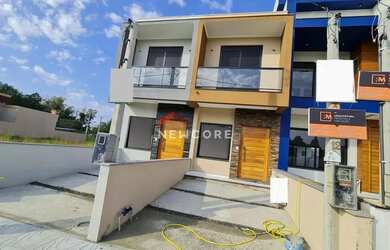 Imagem: A casa possui 2 Dormitórios, 3 Banheiros, 1 Vaga na garagem