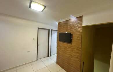 Imagem: A casa possui 2 Dormitórios, Acomodam 13 pessoas, 2 Vagas na