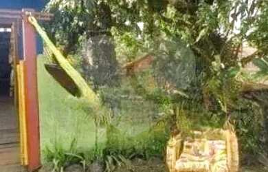 Imagem: A casa possui 3 Dormitórios, 3 Banheiros, 4 Vagas na garagem