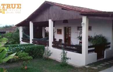 Imagem: A casa possui 3 Dormitórios, 2 Banheiros, 3 Vagas na garagem