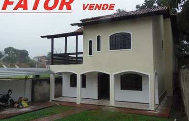 Imagem: A casa possui 4 Dormitórios, 3 Banheiros, 5 Vagas na garagem