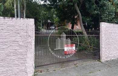 Imagem: A casa possui 4 Dormitórios, 3 Banheiros, 5 Vagas na garagem