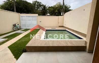 Imagem: A casa possui 3 Dormitórios, 2 Banheiros, 3 Vagas na garagem