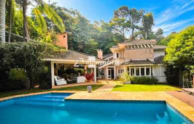 Imagem: A casa em condomínio à venda possui 4 Dormitórios, 5 Banheiros