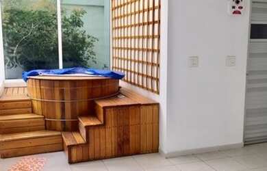 Imagem: A casa possui 3 Dormitórios, 4 Banheiros, 4 Vagas na garagem