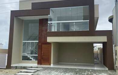 Imagem: A casa em condomínio possui 5 Dormitórios, 5 Banheiros, 2