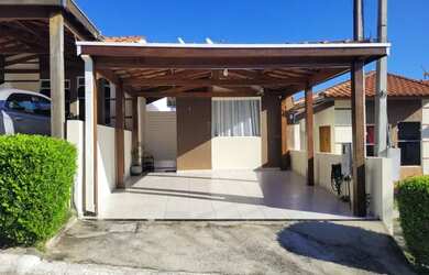 Imagem: A casa em condomínio possui 2 Dormitórios, 2 Banheiros, 3