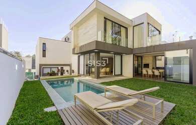 Imagem: A casa em condomínio possui 4 Dormitórios, 5 Banheiros, 4