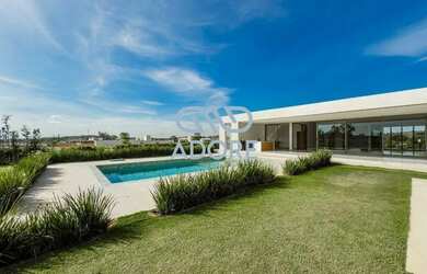 Imagem: A casa em condomínio à venda possui 5 Dormitórios, 5 Banheiros