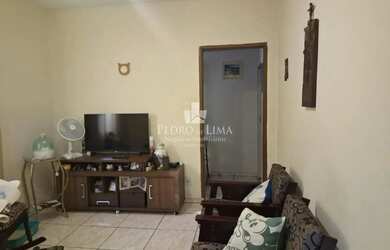 Imagem: A casa possui 2 Dormitórios, 2 Banheiros, 2 Vagas na garagem