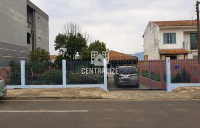 Imagem: A casa possui 4 Dormitórios, 1 Banheiro, 1 Vaga na garagem