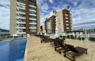 Imagem: O apartamento possui 3 Dormitórios, 2 Banheiros, 2 Vagas na