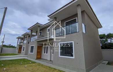 Imagem: A casa possui 2 Dormitórios, 3 Banheiros, 1 Vaga na garagem