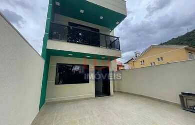 Imagem: A casa possui 3 Dormitórios, 5 Banheiros, 2 Vagas na garagem