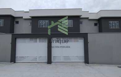 Imagem: A casa possui 2 Dormitórios, 3 Banheiros, 1 Vaga na garagem