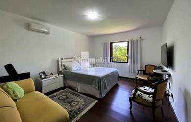 Imagem: A casa em condomínio possui 4 Dormitórios, 5 Banheiros, 5