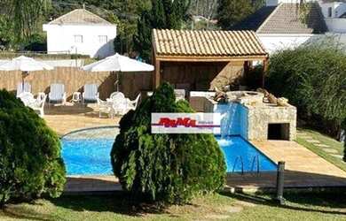 Imagem: A casa em condomínio possui 5 Dormitórios, 5 Banheiros, 5