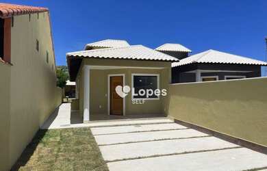 Imagem: A casa possui 2 Dormitórios, 1 Banheiro, 2 Vagas na garagem