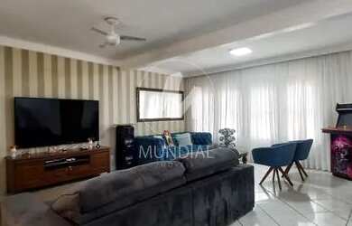 Imagem: A casa possui 3 Dormitórios, 4 Banheiros, 5 Vagas na garagem