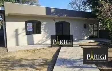 Imagem: A casa possui 3 Dormitórios, 2 Banheiros, 2 Vagas na garagem