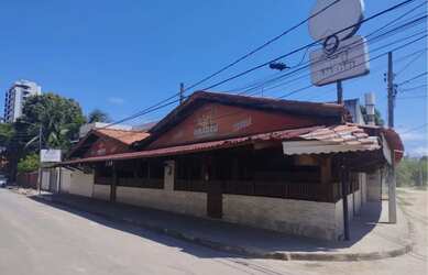 Imagem: A casa possui 3 Dormitórios, 5 Banheiros, 3 Vagas na garagem