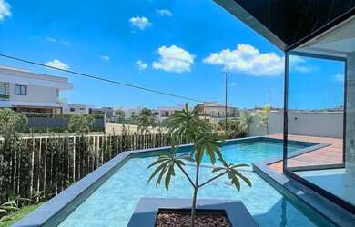 Imagem: A casa em condomínio possui 5 Dormitórios, 5 Banheiros, 5