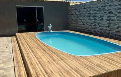 Imagem: A casa possui 3 Dormitórios, 3 Banheiros, 3 Vagas na garagem