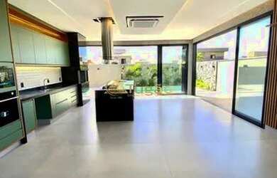 Imagem: A casa em condomínio possui 4 Dormitórios, 5 Banheiros, 4