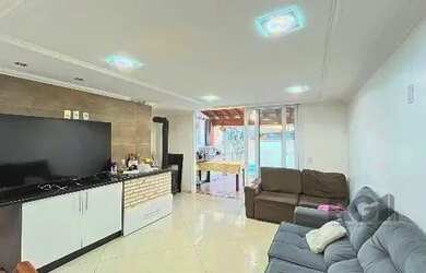 Imagem 13: Casa em Porto Alegre, no bairro Hípica, com 3 dormitório s , e 3 banheiros,...