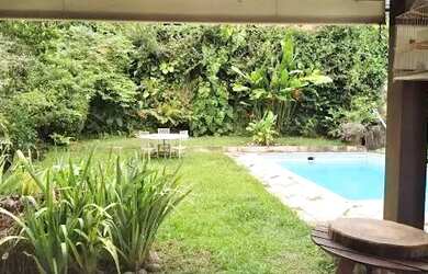 Imagem: A casa em condomínio possui 4 Dormitórios, 4 Banheiros, 2