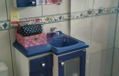 Imagem: A casa possui 3 Dormitórios, 4 Banheiros, 2 Vagas na garagem