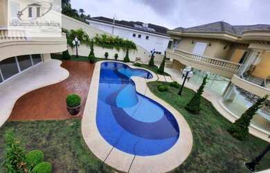 Imagem: A casa em condomínio possui 5 Dormitórios, 5 Banheiros, 5