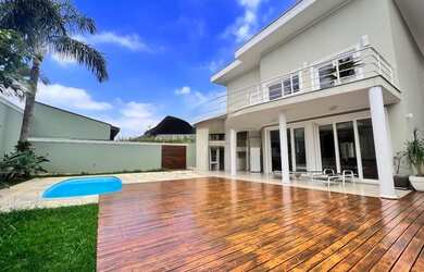 Imagem: A casa em condomínio possui 3 Dormitórios, 3 Banheiros, 5