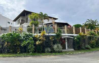 Imagem: A casa possui 4 Dormitórios, 5 Banheiros, 5 Vagas na garagem