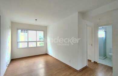 Imagem: O apartamento possui 2 Dormitórios, 1 Banheiro, 1 Vaga na garagem