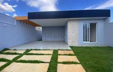 Imagem: A casa possui 3 Dormitórios, 2 Banheiros, 4 Vagas na garagem