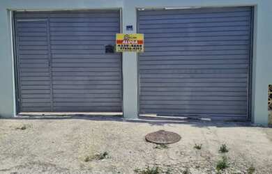 Imagem: A casa possui 2 Dormitórios, 1 Banheiro, 3 Vagas na garagem