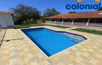 Imagem: A casa possui 3 Dormitórios, 3 Banheiros, 2 Vagas na garagem