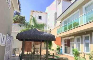 Imagem: A casa possui 4 Dormitórios, 4 Banheiros, 5 Vagas na garagem