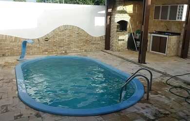 Imagem: A casa possui 3 Dormitórios, 2 Banheiros, 3 Vagas na garagem